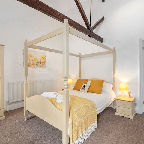 Get a good night's rest in the comfortable four poster bed