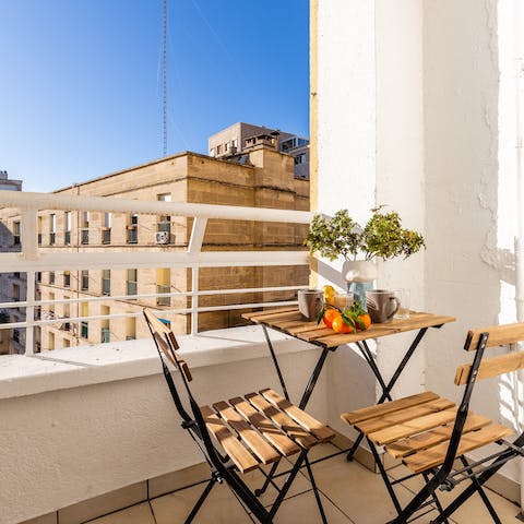 Sip your morning coffee out on your private balcony