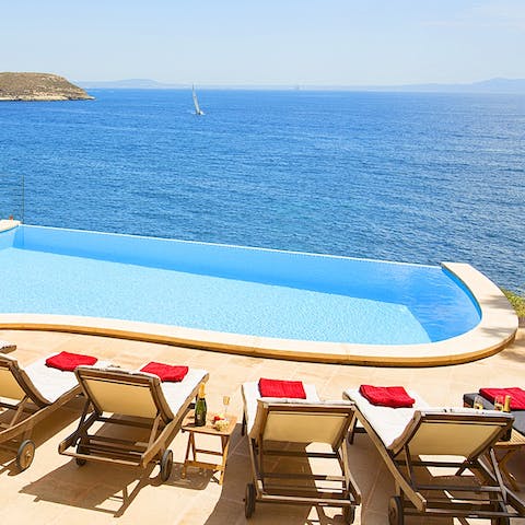 Relax in the sunshine on the stunning pool deck