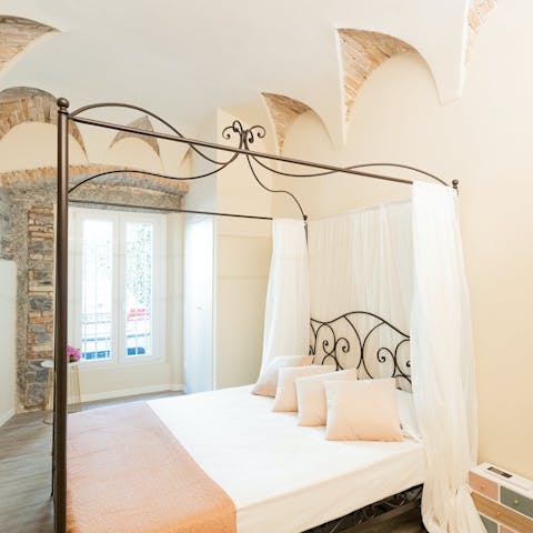 Enjoy a restful night's sleep in the four-poster bed