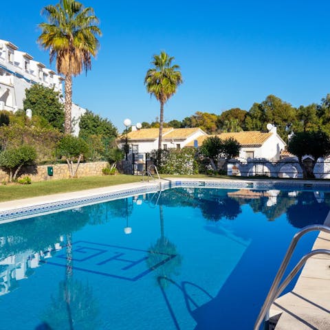 Cool off from the Spanish sun with a dip in the communal pool 