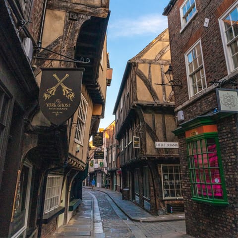 Stroll through the medieval street of The Shambles, a twelve-minute walk away