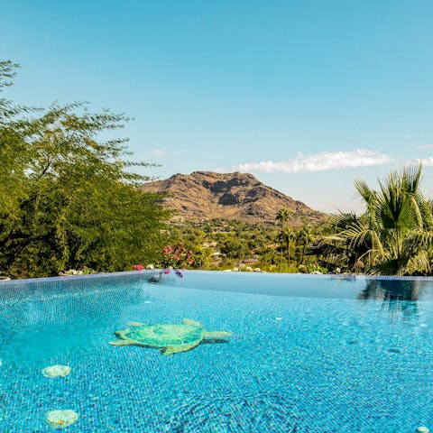 Cool off in the infinity pool surrounded by lush views
