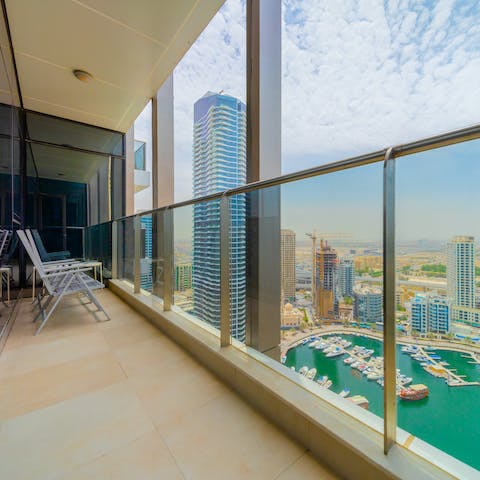Soak up gorgeous views of the marina from your private balcony