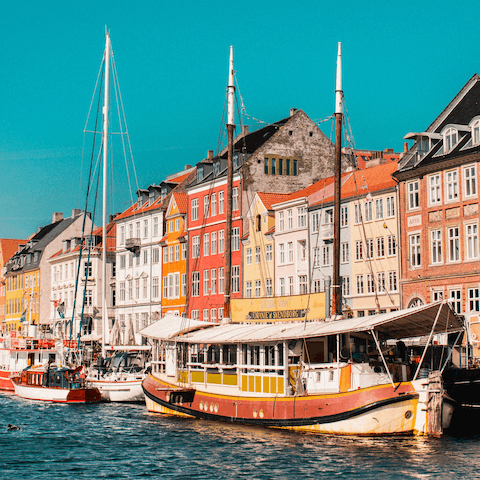 Sip a cold one canalside in colourful Nyhavn – a five-minute walk 