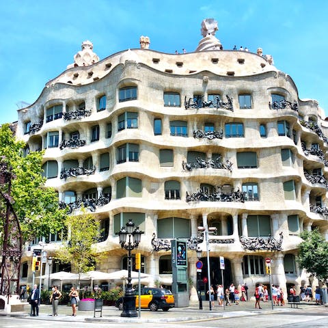 Visit Gaudí's striking Casa Milà, just a short walk away