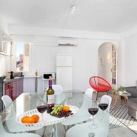 Pour yourself a glass of Spanish wine and enjoy lunch in the light-filled dining area