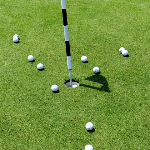 Tee off from the nearby country club's 18-hole golf course 