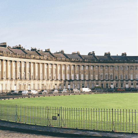 Visit Bath’s beautiful Royal Crescent, around a ten-minute walk away