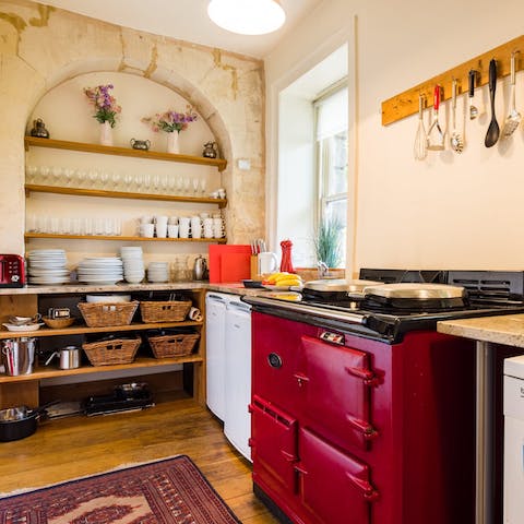 Cook meals on the AGA in the traditional kitchen