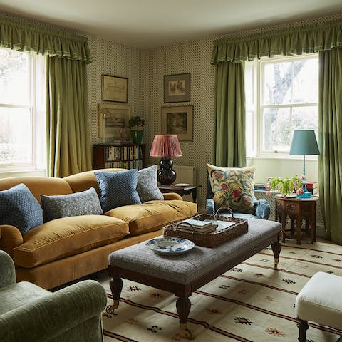 Find a spot to relax in one of three rustic but polished sitting rooms