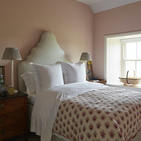 Snuggle up under the floral bedspreads and drift off into a deep sleep