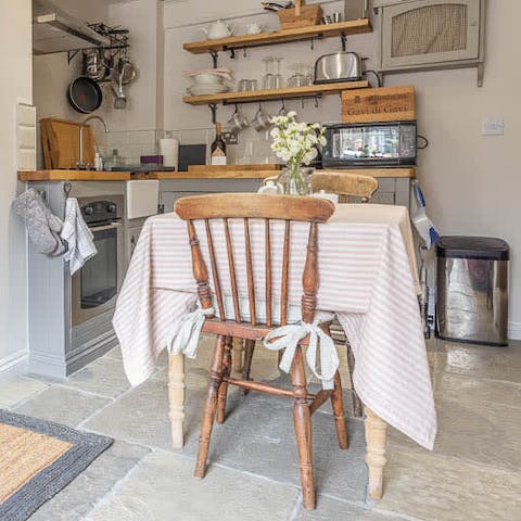 Serve up homemade meals from the quintessential English countryside-style kitchen