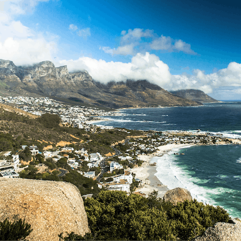 Visit nearby Camps Bay to feel the ocean washing over your feet