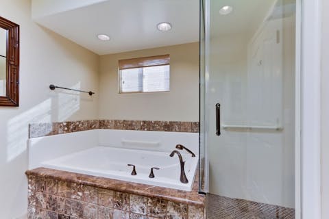 Relax in the master bedroom's jacuzzi tub