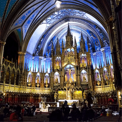 Visit the stunning Notre-Dame Basilica, a fifteen-minute stroll away