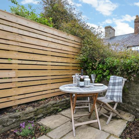 Enjoy an alfresco drink in your delightful courtyard