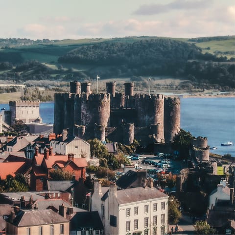 Explore charming Conwy, with its mediaeval castle, marina and beaches