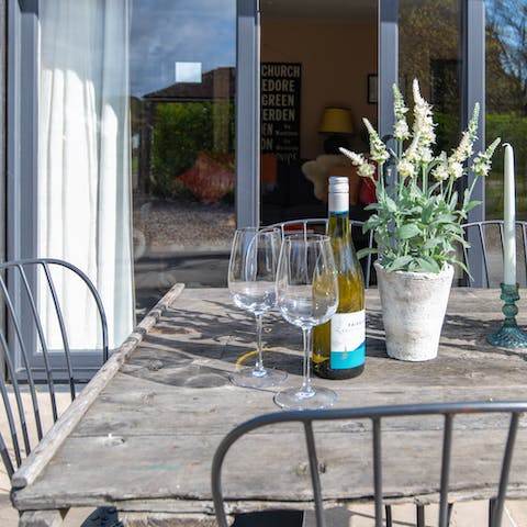 Enjoy a glass of wine on the  terrace, while breathing in the fresh country air