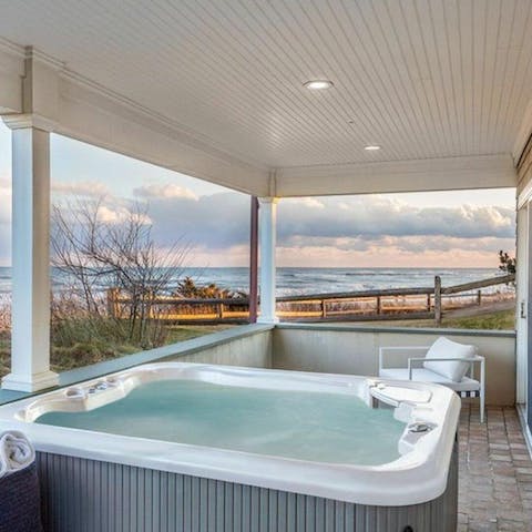 Have a glass of champagne and watch the sunset from your hot tub