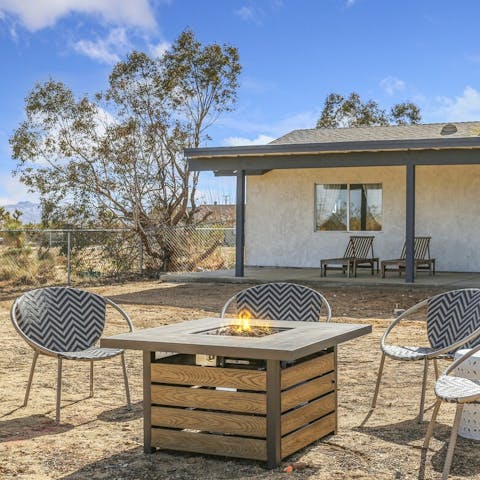 Gather round the fire pit for a nightcap after a day of hiking in Joshua Tree