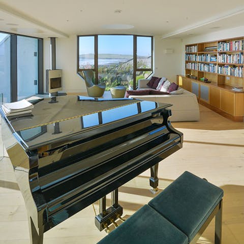 Tinkle the keys on the grand piano while enjoying the views of your stunning surroundings
