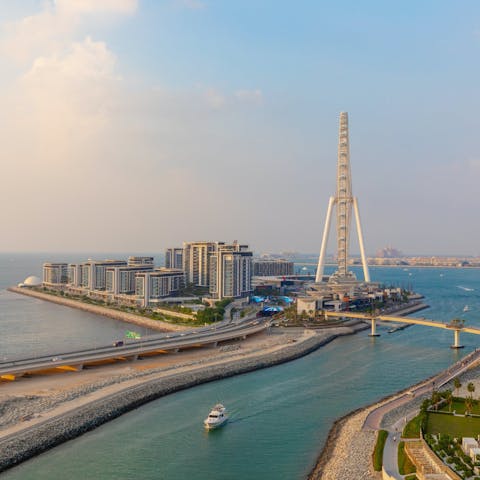 Enjoy postcard views of the Dubai Eye from this high-rise home