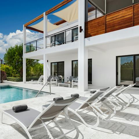 Snooze by the swimming pool, after a round of tennis at the shared on-site courts