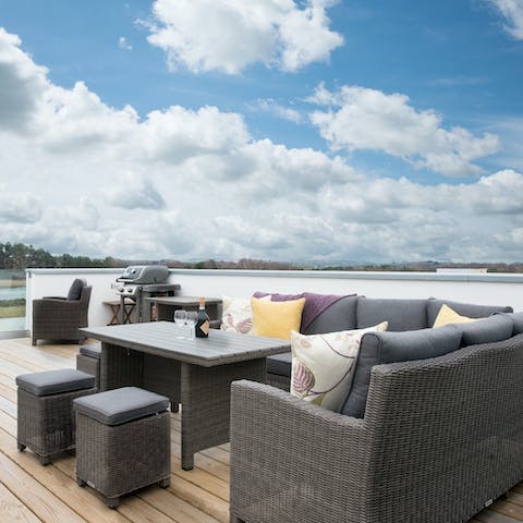 Fire up the barbecue and enjoy a meal on the private roof terrace
