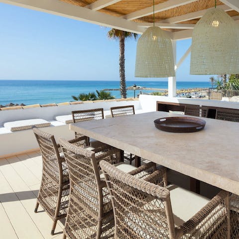 Fire up the grill and dine on the rooftop terrace with a beautiful sea view