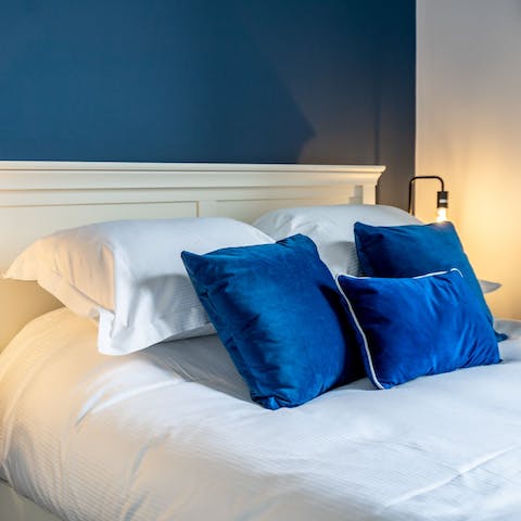 Get a refreshing night of sleep in the plush bedroom