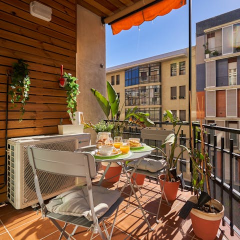 Enjoy a glass of sangria on the balcony while soaking up the sun