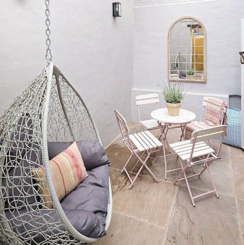 Sit down to afternoon tea in the pretty courtyard