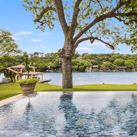 Unwind in the infinity pool, surrounded by lake views