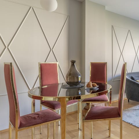 Enjoy meals together around the sleek dining table