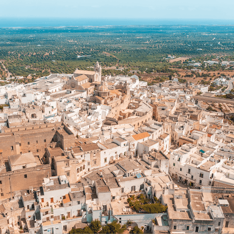 Drive into Ostuni and visit the city's beautiful old town and historic architecture