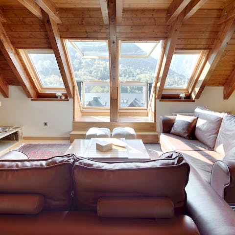 Enjoy the simple pleasure of relaxing by the fire while admiring the views