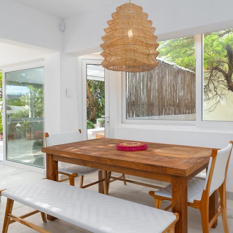 Share leisurely lunches around your sleek wooden dining table