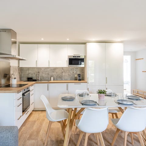 Make plans over croissants and coffee as you dine in the open living and kitchen space