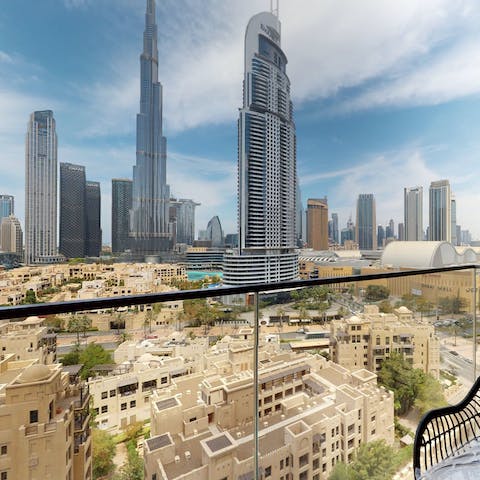 Take in the beautiful city skyline from your private balcony