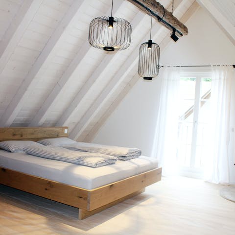 Wake up under the slanted beams with the natural light pouring through
