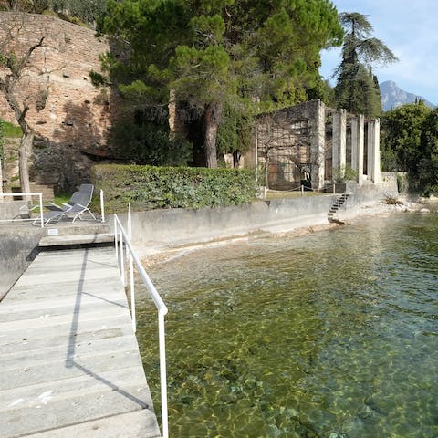 Cast off from the villa’s private dock to explore Lake Garda