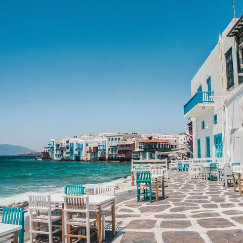 Drive eight minutes to the picturesque waterfront bars of Mykonos Town