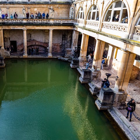 Take in the history at the Roman Baths – Bath is a thirty-minute drive away