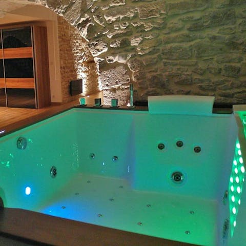 Relax with a glass of champagne in the hot tub