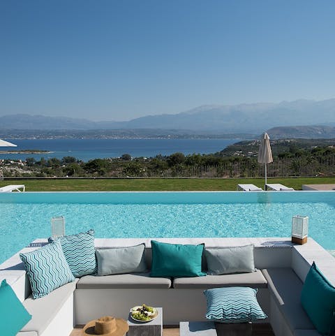 Divide your time between the comfy outdoor seating and the private infinity pool