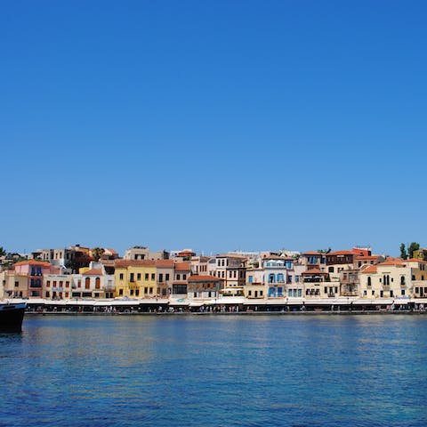Amble along Chania's Venetian harbour, just a thirty minute drive away