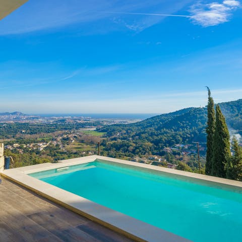 Gaze out at stunning panoramic views from the private pool