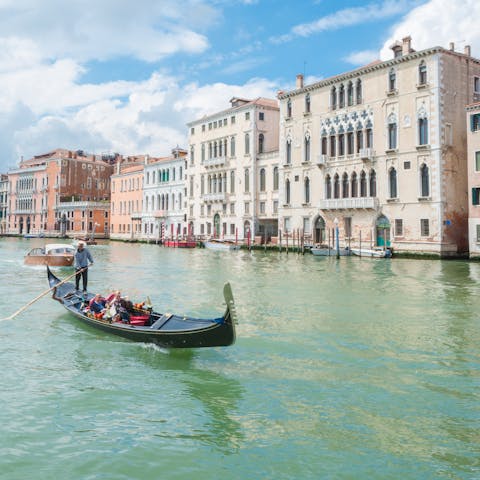 Explore beautiful Venice through its many winding canals on a gondola