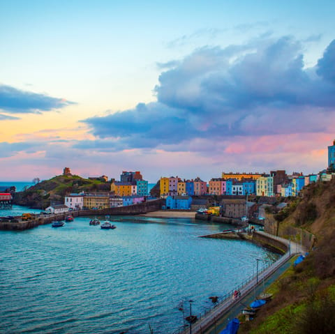 Visit the stunning harbour town of Tenby, a twenty-minute drive away